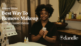 African American esthetician sitting in spa room, holding skincare jar, with title "best way to remove makeup according to a licensed esthetician" 