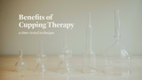 Clear glass cupping therapy devices on a light wooden surface with text about benefits.