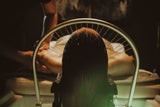 woman receiving a scalp massage at chattanooga head spa at dandle day spa