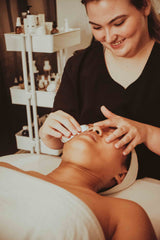 Young girl receiving a gua sha facial treatment in the best day spa in Chattanooga setting
