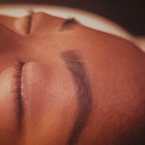 close up of woman's eye brows and lashes after Chattanooga lash & brow treatment at Dandle Spa